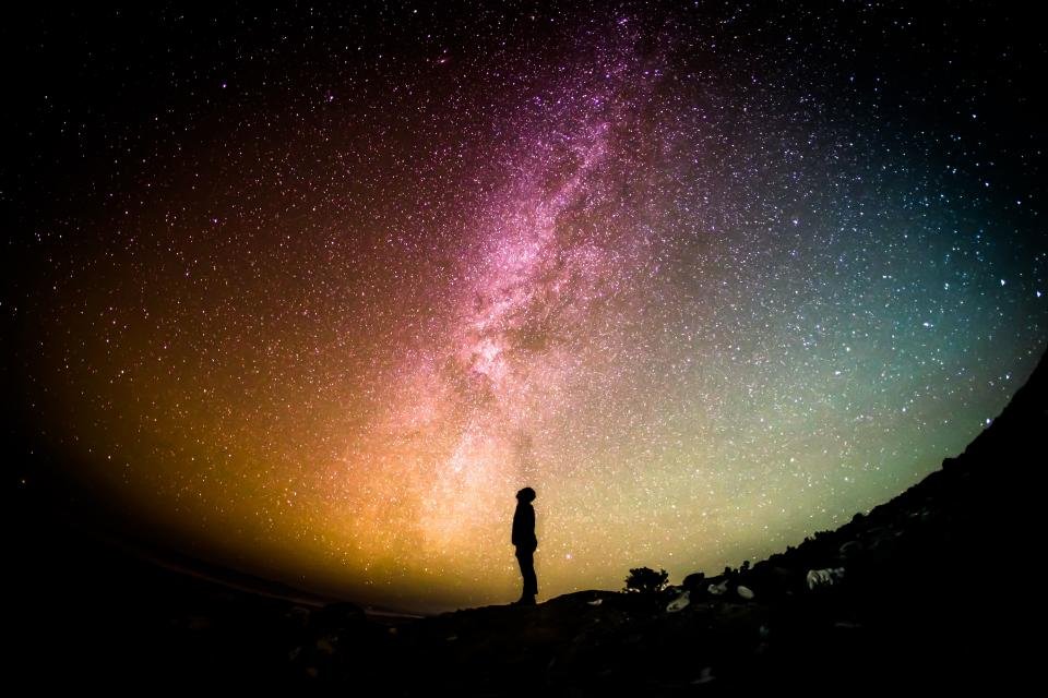 The Milky Way over a lone stargazer